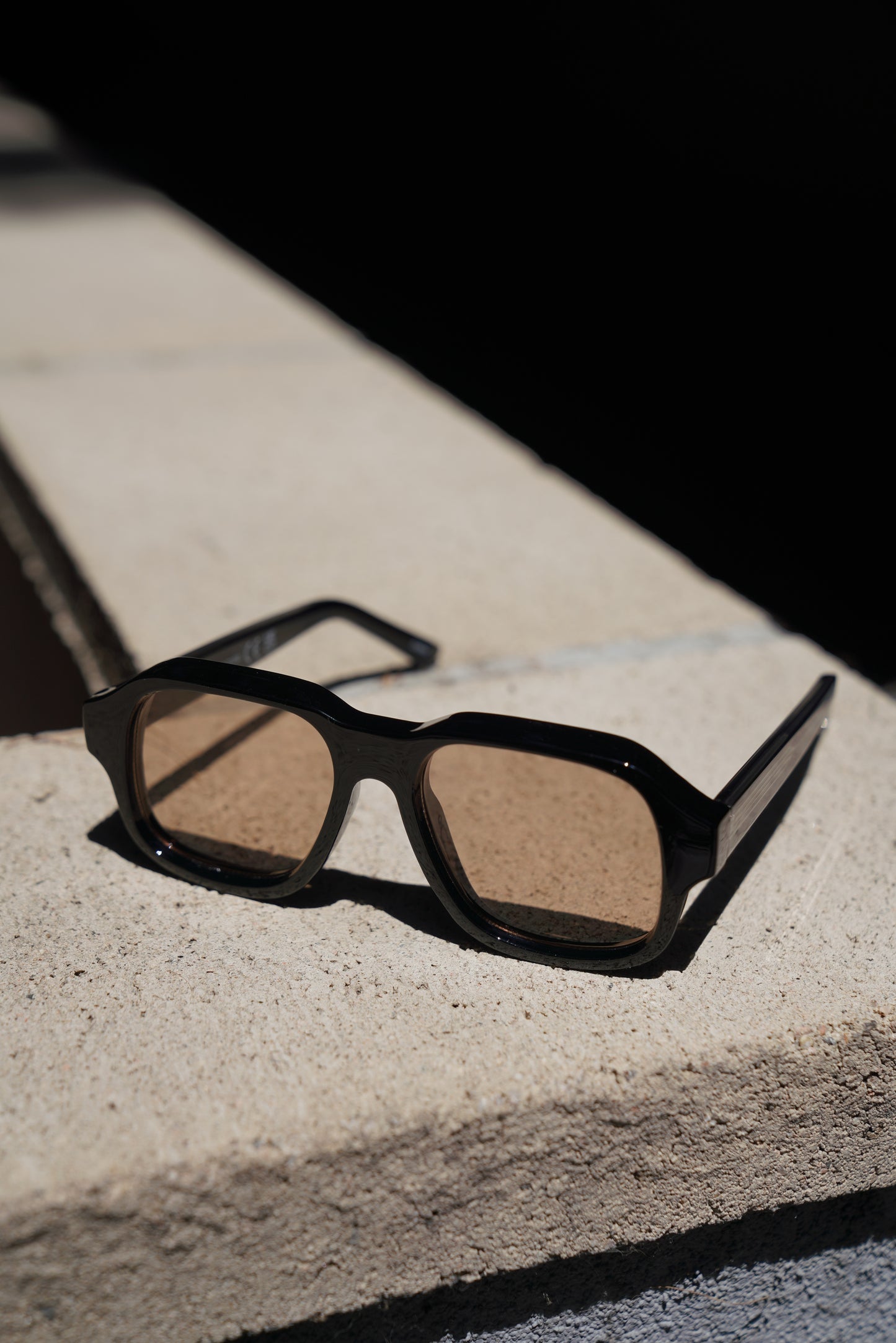 Black Retro Square Sunglasses – Transparent Frame with Brown Lens