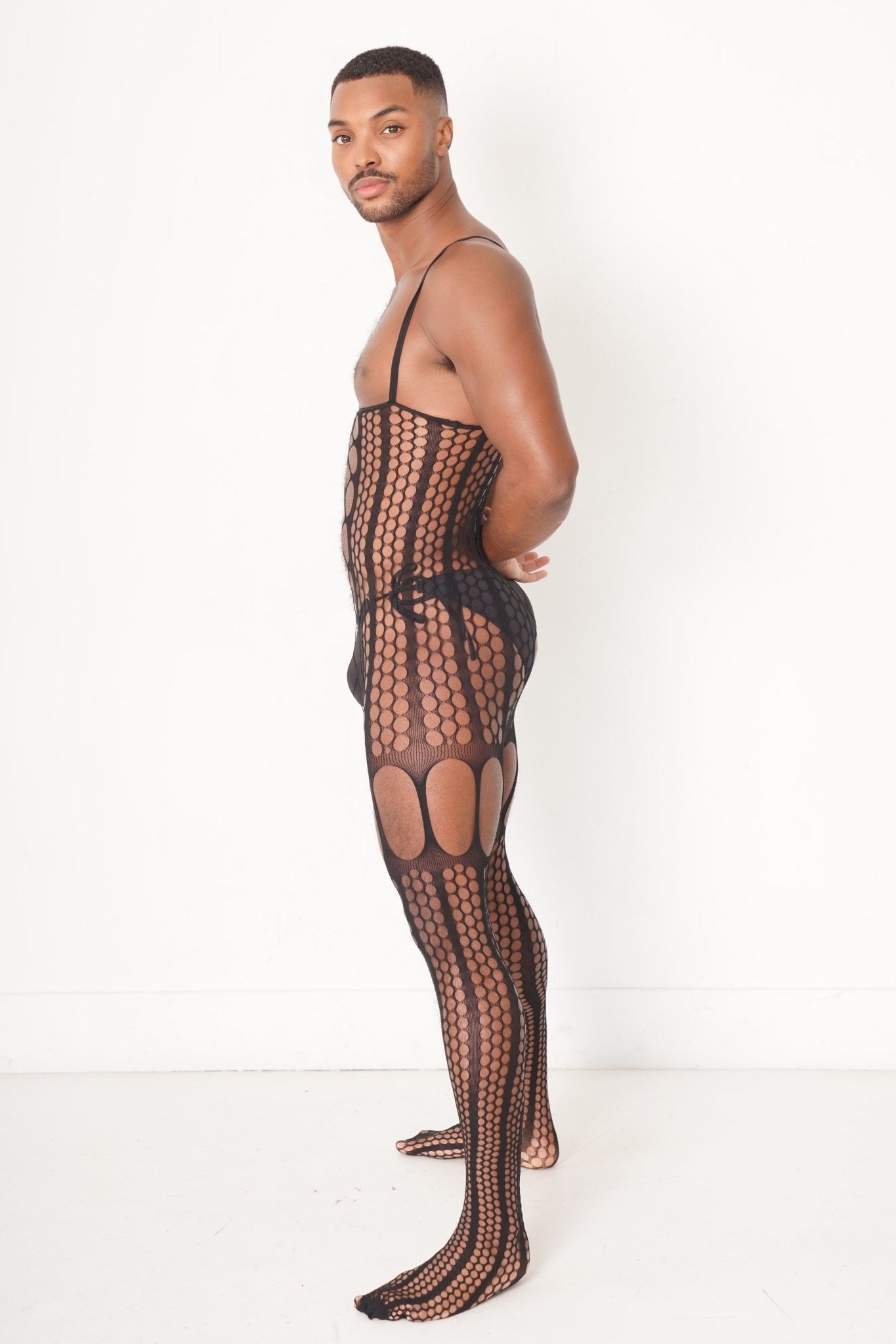 Black Hollow Fishnet Bodysuit on model, Body Suit, mesh nightwear, bdsm bodysuit, lgbtq bodysuit, fetish bodysuit