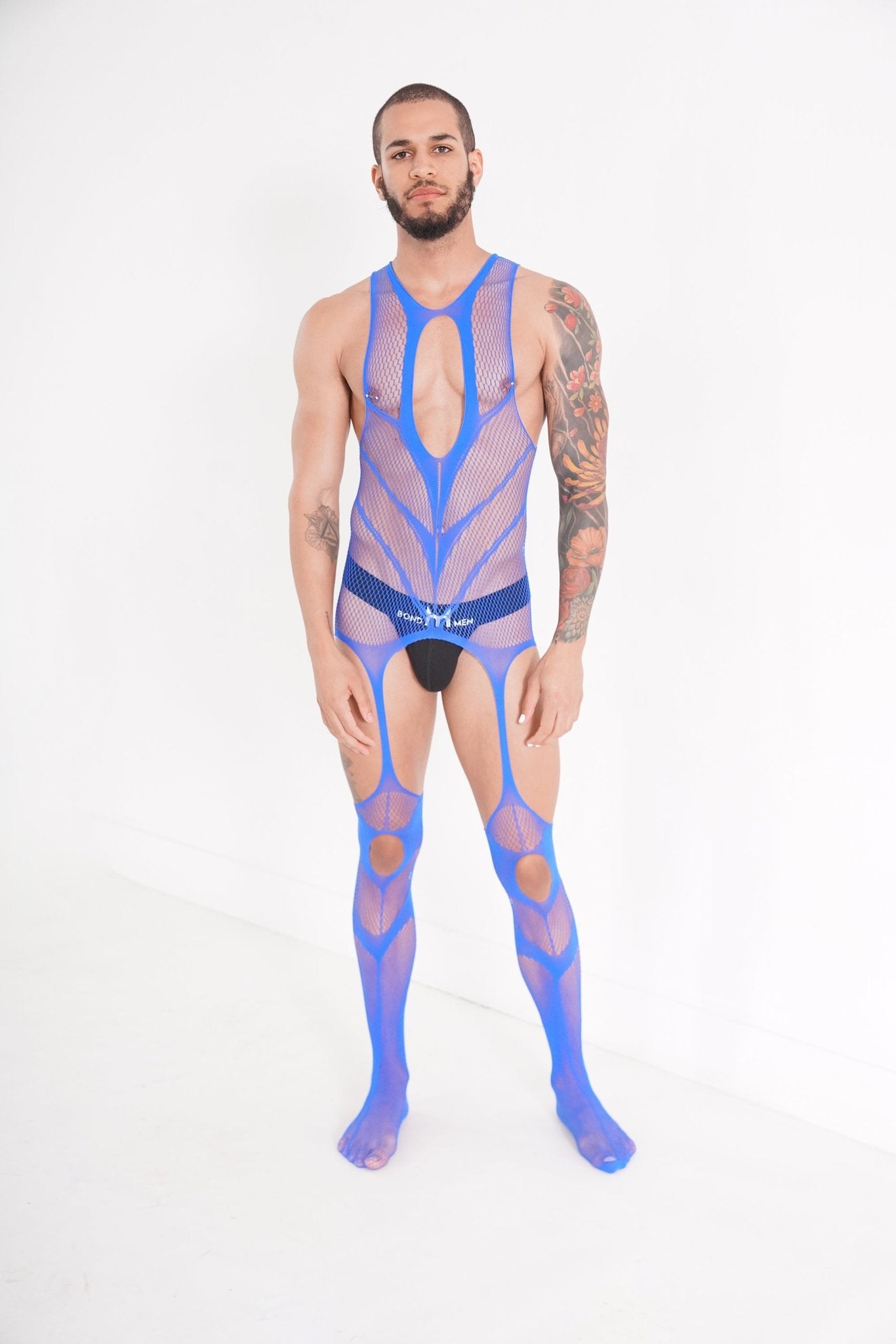 Blue Hollow Fishnet Bodysuit on model, body suit, bdsm bodysuit, lgbtq bodysuit, fetish bodysuit