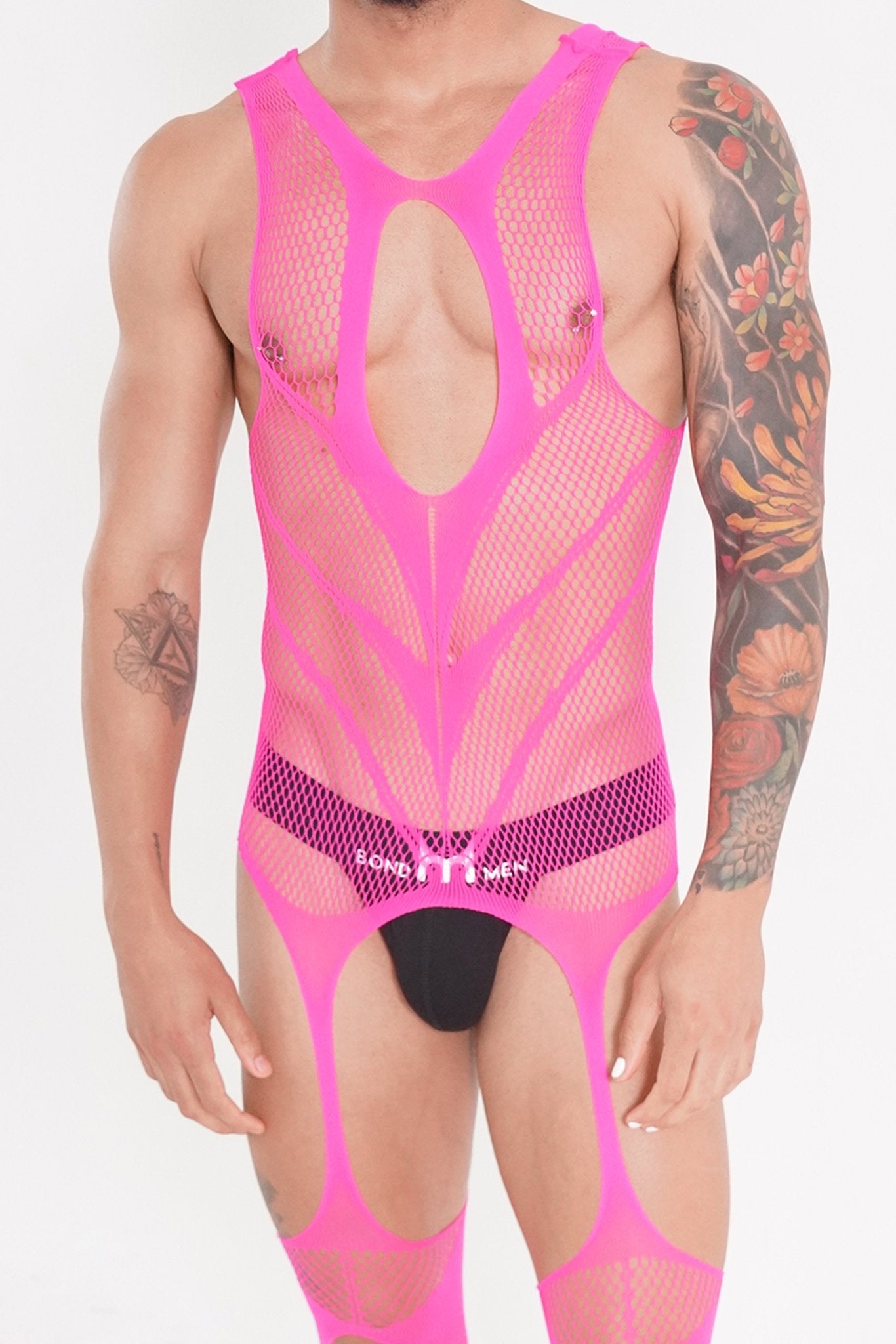 Pink Hollow Fishnet Bodysuit on model, body suit, bdsm bodysuit, lgbtq bodysuit, fetish bodysuit